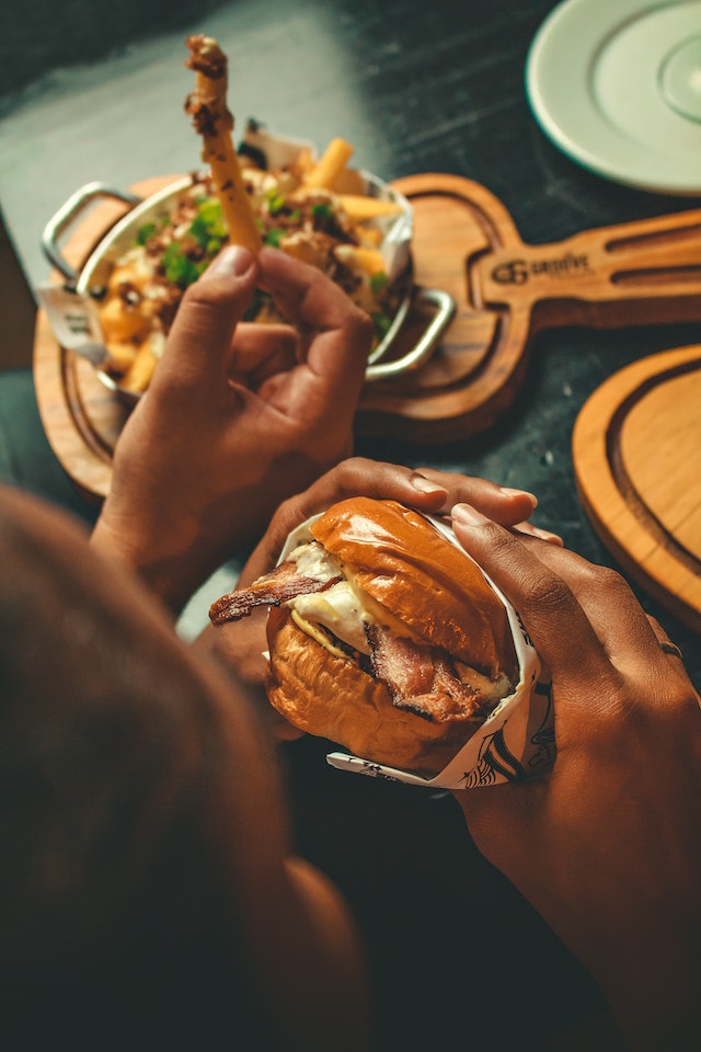 About to eat a burger and fries