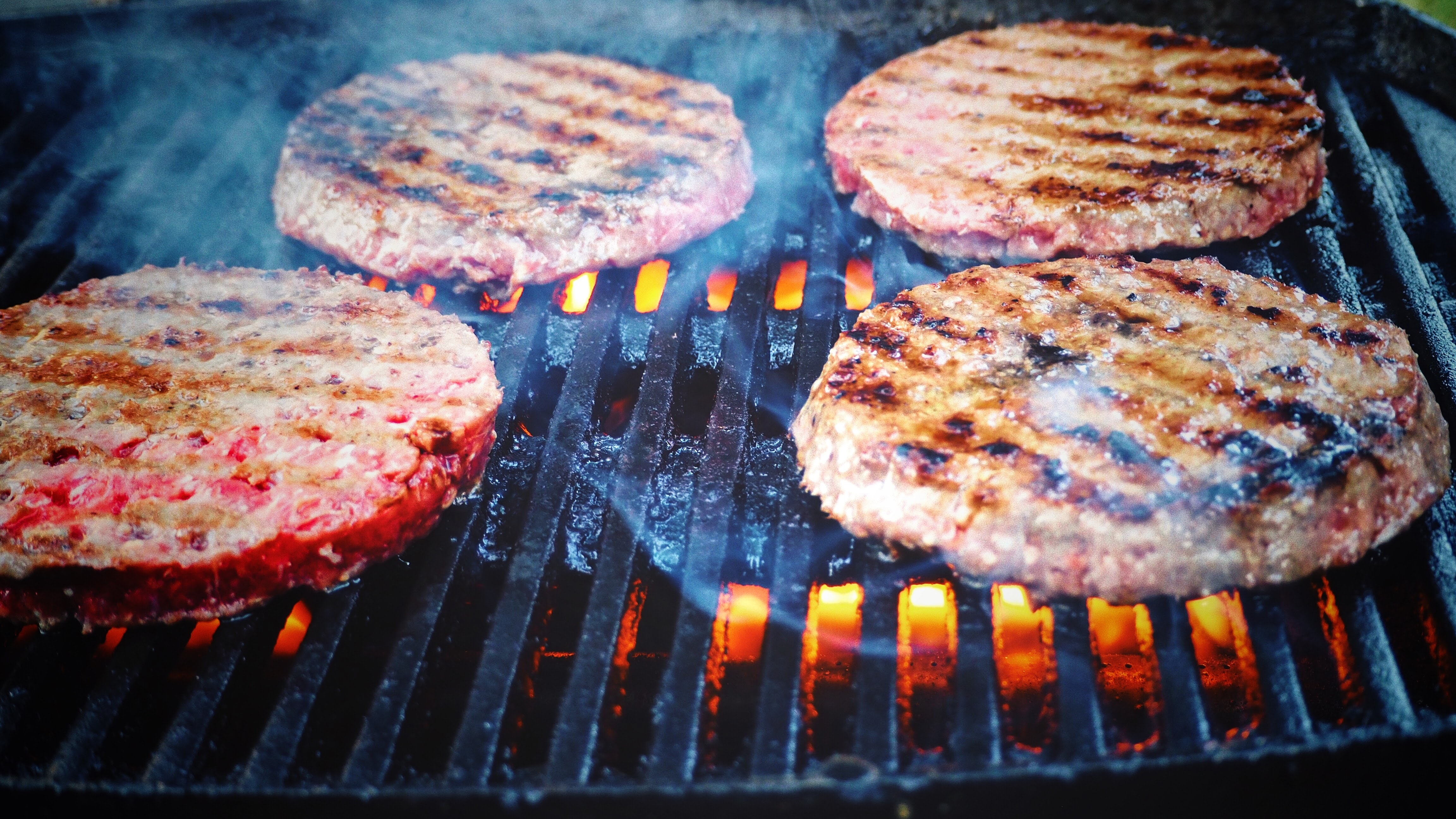 Burger meat on grill